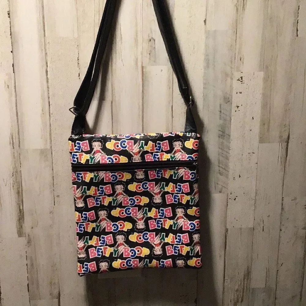 Purse great Betty Boop minor damage where strap attaches shown